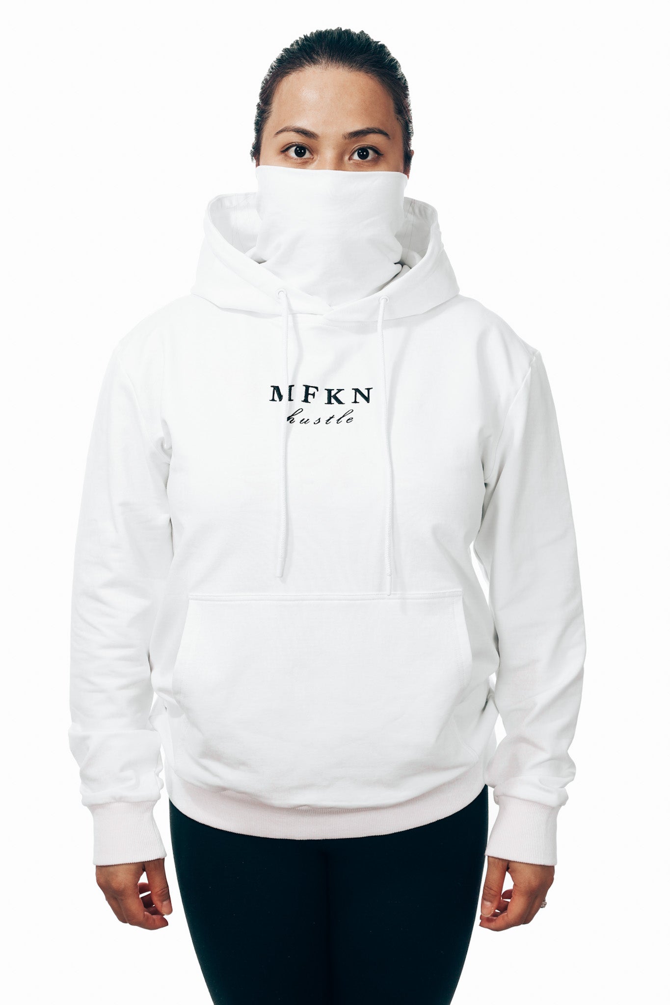 A front view portrait of a woman wearing a white MFKN Hustle face mask hoodie.